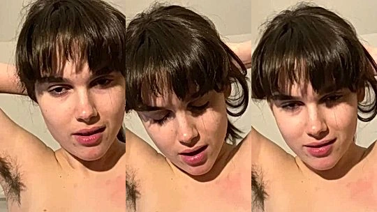 Maria Sofia Federico tying her hair up and giving a blowjob