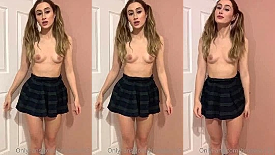 hot babe Bronwin teasing her naked small tits in short skirt