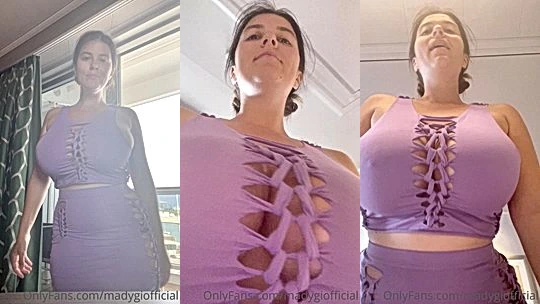 Mady Gio teasing her naked huge tits bottom view