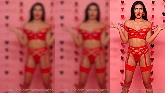 Mikaela Pascal showing off her red strappy lingerie