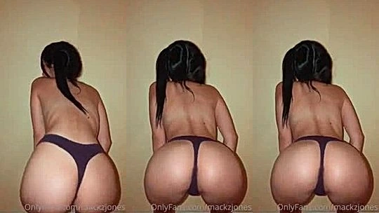 hot chick Mackenzie Jones teasing her big ass in black thongs