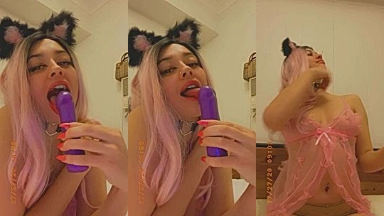 Bree Louise sucking on a dildo in her cat outfit