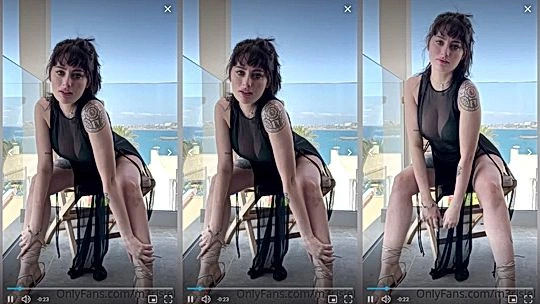 Merisiel Irum teasing her sexy black night gown on the balcony