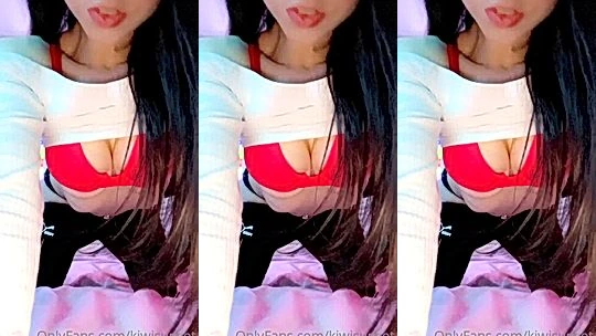 Kiwi Sunset showing off her sexy red bra in bed