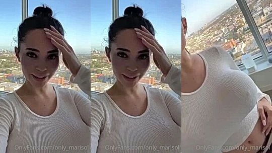 Marisol Yotta showing off her big tits by the window sill