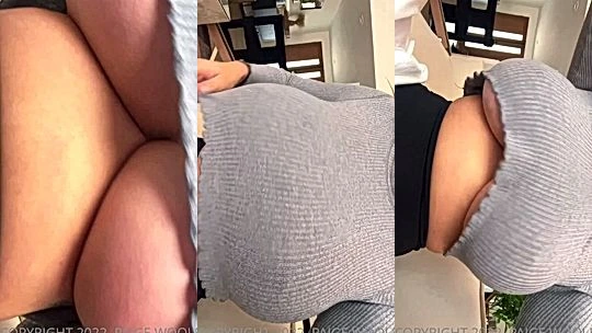 Paige Woolen playing with her big boobies in grey sweater