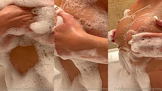 Madison Ginley playing with her soapy big tits in the bathtub