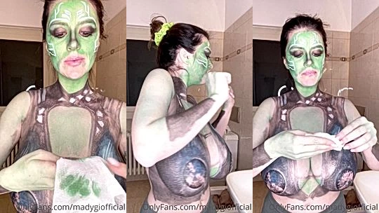 Mady Gio teasing her big tits in body paint