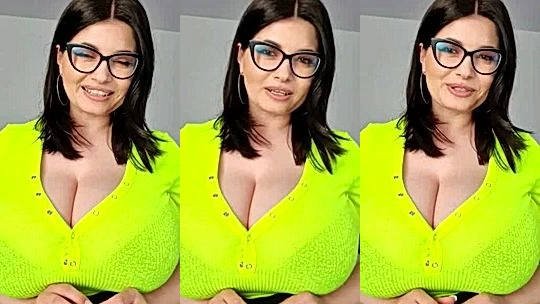 Busty Ema teasing her big boobies in neon yellow top