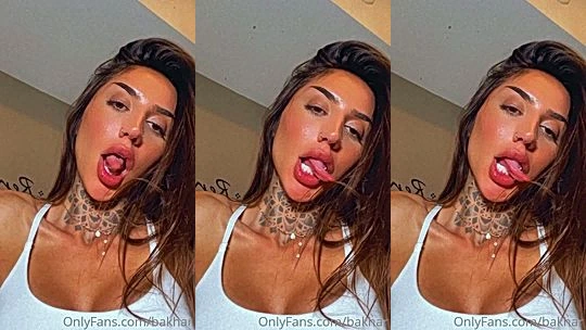 Bakhar Nabieva showing off her big tits in white top