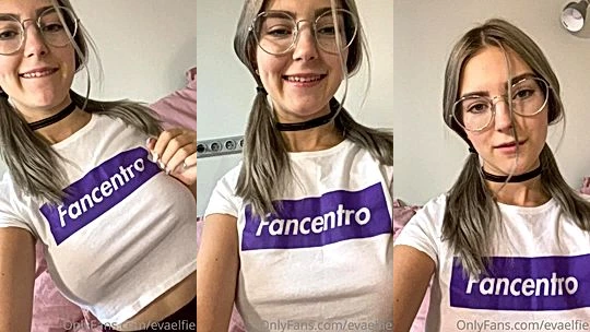Eva Elfie squeezing her big tits wearing t-shirt