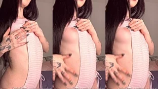 Mia Yokai teasing her hot body wearing a pink bodysuit