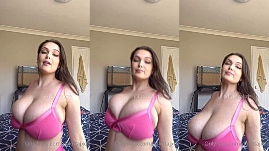 Dakota Jade teasing her big tits in pink bra
