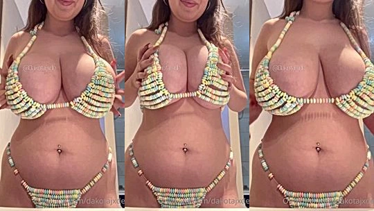 Dakota Jade teasing her big tits in sexy bikini