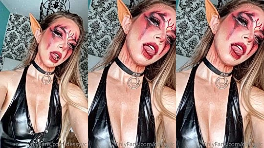 Dessyyc showing off her vampire latex cosplay