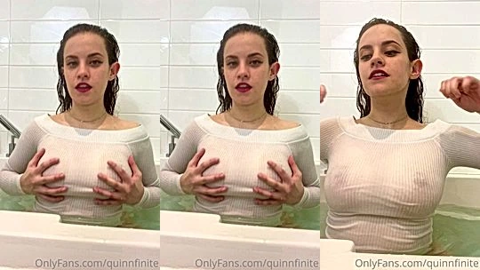 hot slut QuinnFinite teasing her naked big tits in the bathtub