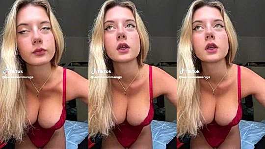 Laura Sommaruga showing off her deep cleavage in red bra