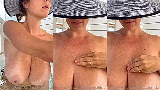 Mady Gio teasing her big tits wearing a cowboy hat