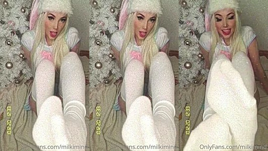 Milkimind teasing her feet in white knee-high socks
