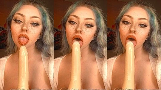 Luxlo sucking on a long white dildo