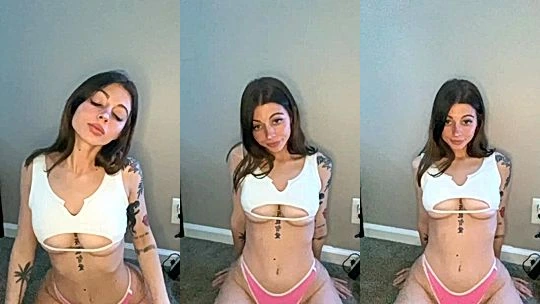 Noemiexlili teasing her big tits in her white top