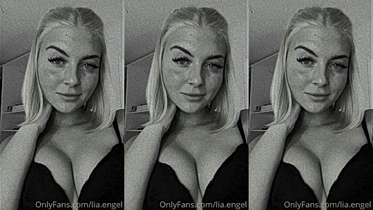 Lia Engel teasing her perky tits in black bra