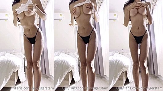 Ploytigerstam teasing her naked tits in black panties