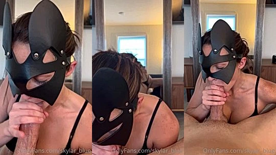 leather masked girl Skylar blue sucking on a big cock with a mirror