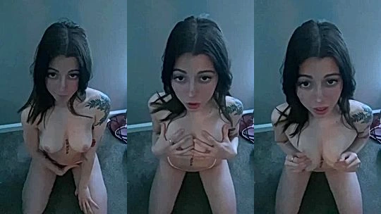 Noemiexlili on her knees playing with her big tits