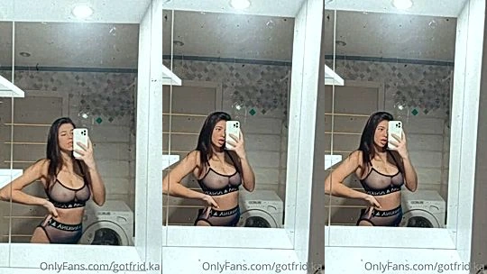 Cristy Ren teasing her black sexy lingerie in the mirror