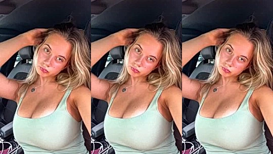 Italian chick Laura Sommaruga teasing her big tits in the car