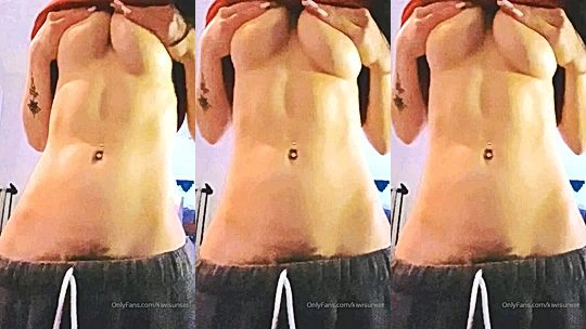Kiwi Sunset teasing her naked perky tits and six packs