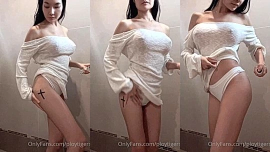 Ploytigerstam teasing her naked body in see-through shirt