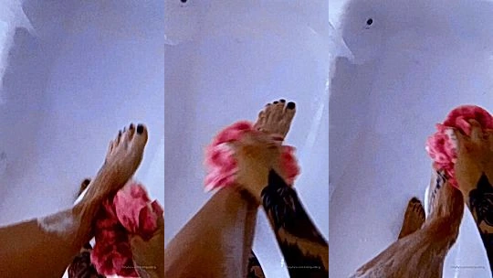 Strawberrysquirtcake teasing her wet feet in the bathtub