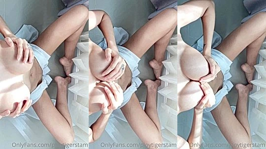 Ploytigerstam playing with her naked perky tits on the floor