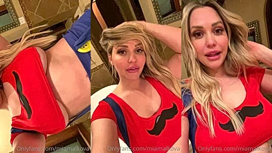 Mia Malkova flashing her naked tits in christmas top