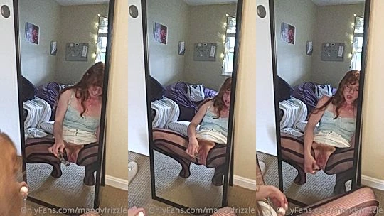 MandyFrizzle fucking a clear dildo in front of a mirror
