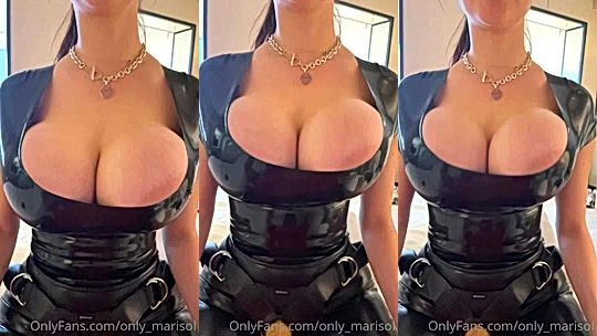 hot Latina girl Marisol Yotta teasing her big tits in her latex bodysuit