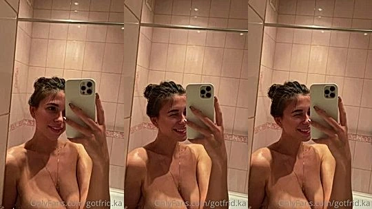 Cristy Ren teasing her naked big tits after a shower