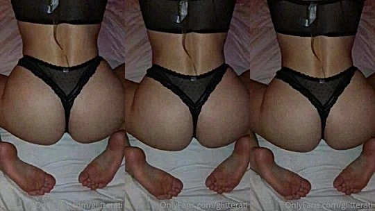 Glitterati teasing her big booty in black see-through lingerie