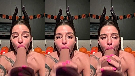 cosplay girl Sonya Jess sucking on a big dildo