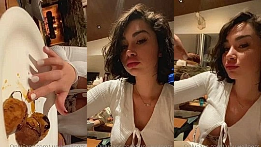 LupuWellness teasing her boobies in the restaurant
