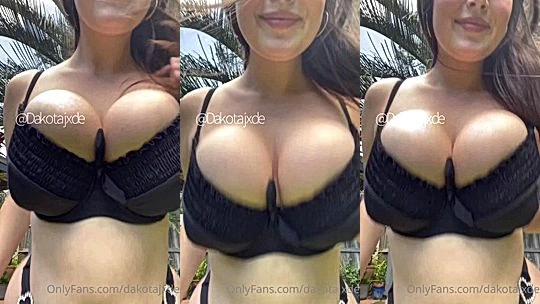 Dakota Jade teasing her big tits wearing black sex lingerie