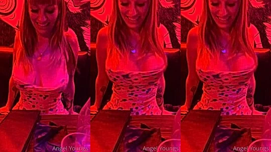 Angel Youngs showing off her wet big tits in the red room