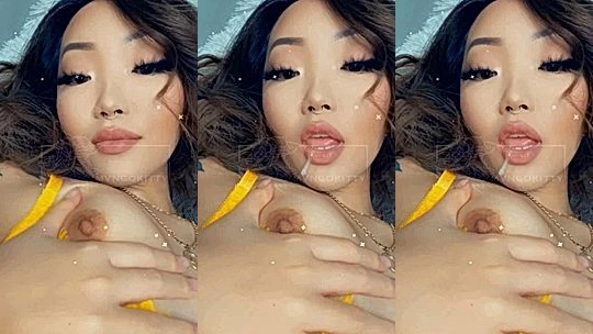 Mvngokitty licking her perky nipples in bed