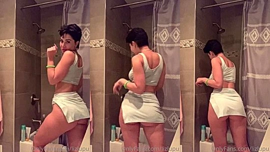 LupuWellness getting her dress wet in the shower