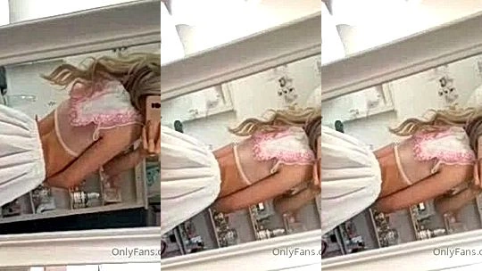Milkimind teasing her big booty in short white skirt in the mirror
