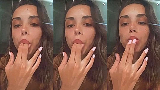 Liza Kovalenko sucking on her fingers