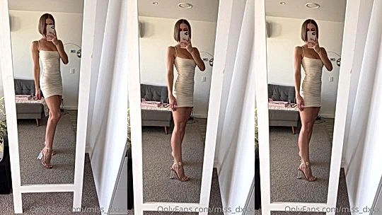 Miss_Dxxx teasing her sexy white dress in the mirror