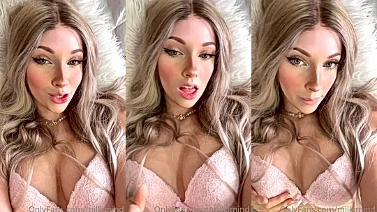 Milkimind teasing her perky tits in pink bra